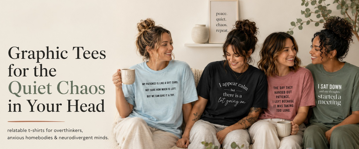 Four women sitting together indoors wearing graphic t-shirts with humorous quotes. The image includes text on the left reading 'Graphic Tees for the Quiet Chaos in Your Head' and lists brands like Relatable Tees.