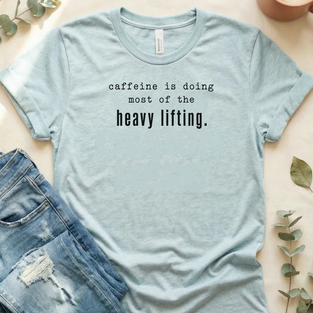 Caffeine Is Doing the Heavy Lifting T-Shirt – Heather Prism Ice Blue Bella Canvas Unisex Tee | Quiet Chaos Co