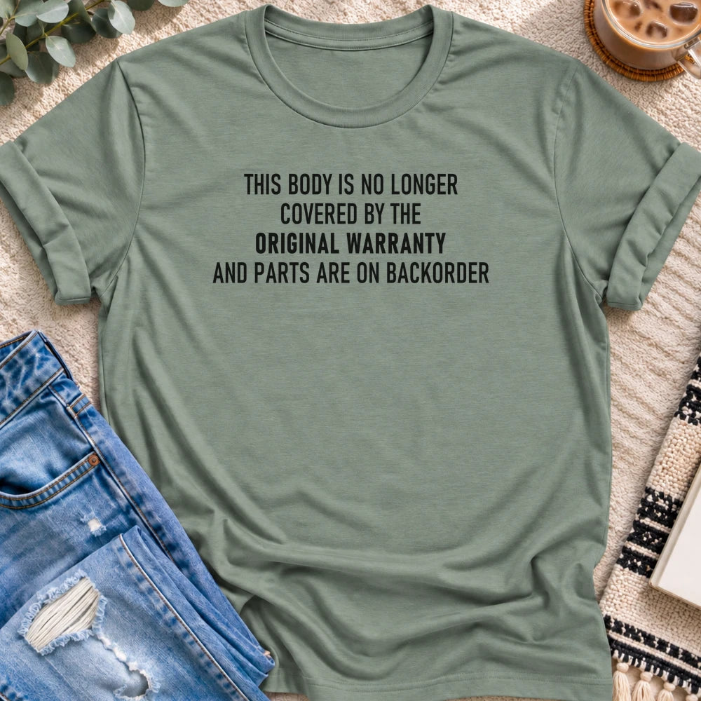 No Longer Covered by the Original Warranty T-shirt in Sage - Quiet Chaos Co unisex mental health tee